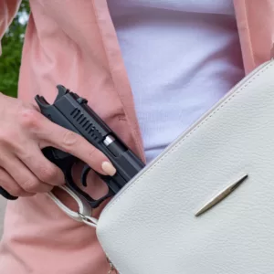 a woman with a fashionable and practical concealed carry purse