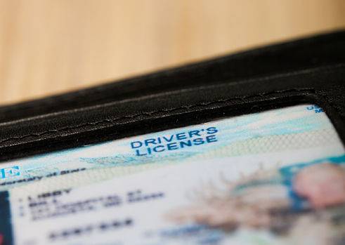 A driver's license is one of the things needed for FFL transfers.