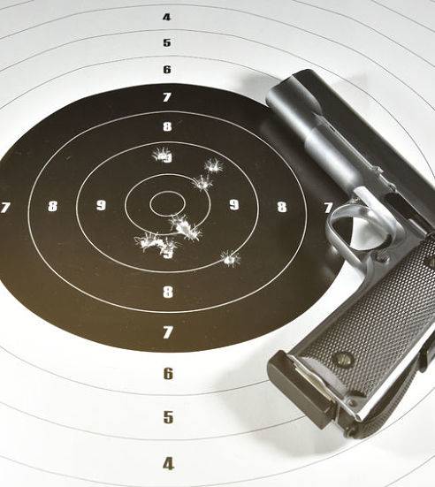 CCW Chicago - handgun and shooting target.